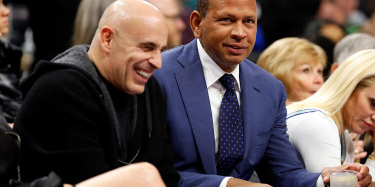 MINNEAPOLIS, MINNESOTA - DECEMBER 30: Co-owners Alex Rodriguez (R) and Marc Lore of the Minnesota Timberwolves look on in the second quarter during the game against the Los Angeles Lakers at Target Center on December 30, 2023 in Minneapolis, Minnesota. NOTE TO USER: User expressly acknowledges and agrees that, by downloading and or using this photograph, User is consenting to the terms and conditions of the Getty Images License Agreement. (Photo by David Berding/Getty Images)