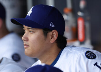 LOS ANGELES, CALIFORNIA - OCTOBER 25: Shohei Ohtani #17 of the Los Angeles Dodgers looks on from the dugout before Game One of the 2024 World Series against the New York Yankees at Dodger Stadium on October 25, 2024 in Los Angeles, California. (Photo by Harry How/Getty Images)