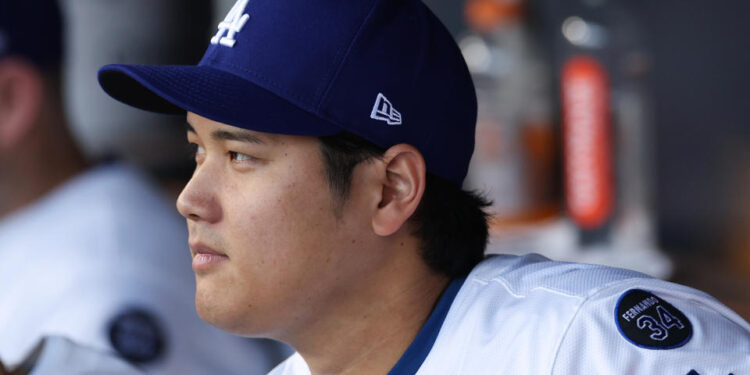 LOS ANGELES, CALIFORNIA - OCTOBER 25: Shohei Ohtani #17 of the Los Angeles Dodgers looks on from the dugout before Game One of the 2024 World Series against the New York Yankees at Dodger Stadium on October 25, 2024 in Los Angeles, California. (Photo by Harry How/Getty Images)