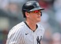 New York Yankees third baseman DJ LeMahieu (26) runs to first during his RBI single during the seventh inning against the Boston Red Sox at Yankee Stadium