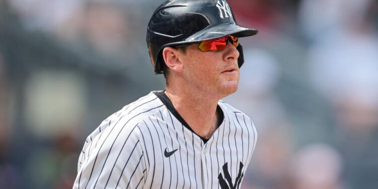 New York Yankees third baseman DJ LeMahieu (26) runs to first during his RBI single during the seventh inning against the Boston Red Sox at Yankee Stadium