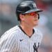 New York Yankees third baseman DJ LeMahieu (26) runs to first during his RBI single during the seventh inning against the Boston Red Sox at Yankee Stadium