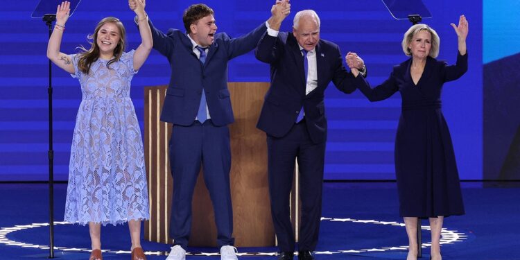 U.S. Democratic vice presidential nominee Minnesota Governor Tim Walz, his wife Gwen Walz and son and daughter Gus and Hope stand onstage on Day 3 of the Democratic National Convention