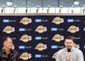 EL SEGUNDO, CA, FEBRUARY 4, 2025: General Manager Rob Pelinka, left, introduces new Lakers player Luka Doncic, right, at the Lakers training facility in El Segundo on Tuesday, February 4, 2025. (Christina House / Los Angeles Times)