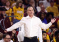 TEMPE, ARIZONA - FEBRUARY 01: Head coach Bobby Hurley of the Arizona State Sun Devils removes his tie after being called for a technical foul during the first half against the Arizona Wildcats at Desert Financial Arena on February 01, 2025 in Tempe, Arizona.  (Photo by Chris Coduto/Getty Images)