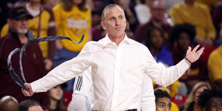 TEMPE, ARIZONA - FEBRUARY 01: Head coach Bobby Hurley of the Arizona State Sun Devils removes his tie after being called for a technical foul during the first half against the Arizona Wildcats at Desert Financial Arena on February 01, 2025 in Tempe, Arizona.  (Photo by Chris Coduto/Getty Images)