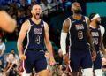 Steph Curry and LeBron James react in the second half against France in the men's basketball gold medal game.