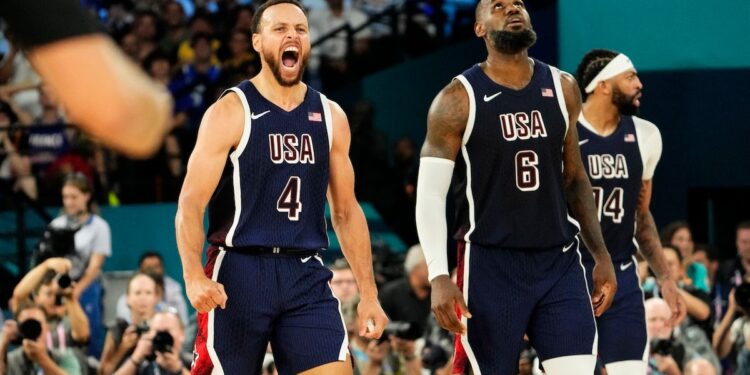 Steph Curry and LeBron James react in the second half against France in the men's basketball gold medal game.