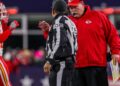 Andy Reid talks to a referee