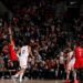 Devin Booker preparing to throw his three-pointer than broke the Phoenix Suns' scoring record.