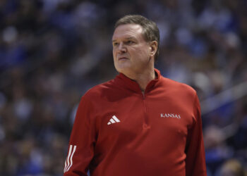 Kansas head coach Bill Self watches play against BYU during the first half of an NCAA college basketball game, Tuesday, Feb. 18, 2025, in Provo, Utah. (AP Photo/Rob Gray)