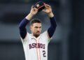 Alex Bregman waves to fans