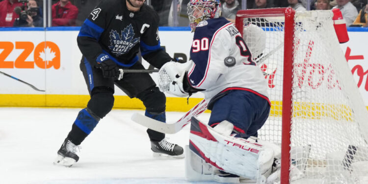 Auston Matthews and Elvis Merzlikins<p>Nick Turchiaro-Imagn Images</p>