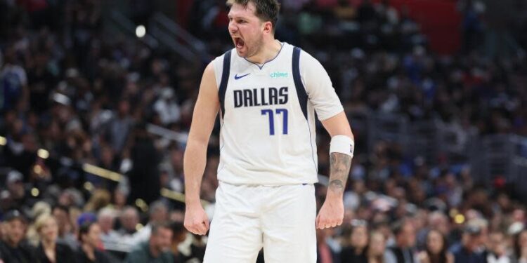 Los Angeles, CA, Tuesday, April 23, 2024 - Dallas Mavericks guard Luka Doncic (77) yells out after hitting a basket late in the game against the Clippers in game two of the NBA Western Conference playoffs at Crypto.Com Arena. (Robert Gauthier/Los Angeles Times)