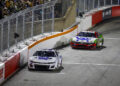 WINSTON SALEM, NORTH CAROLINA - FEBRUARY 02: Chase Elliott, driver of the #9 NAPA Auto Parts Chevrolet and Chris Buescher, driver of the #17 Kroger/Tree Top Ford race during the Cook Out Clash at Bowman Gray Stadium on February 02, 2025 in Winston Salem, North Carolina. (Photo by Sean Gardner/Getty Images)