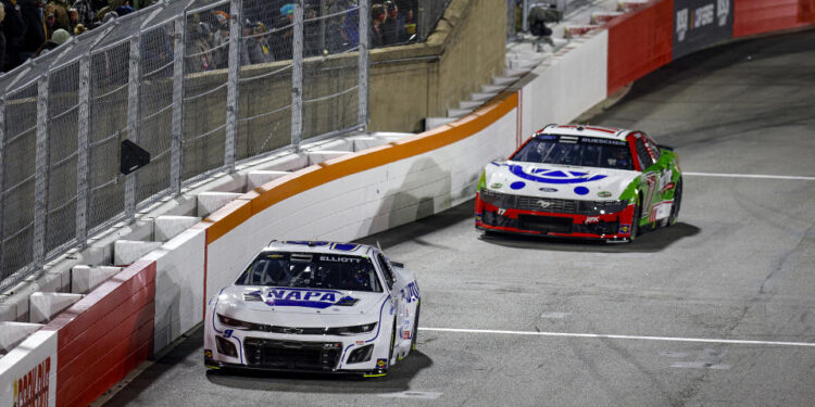 WINSTON SALEM, NORTH CAROLINA - FEBRUARY 02: Chase Elliott, driver of the #9 NAPA Auto Parts Chevrolet and Chris Buescher, driver of the #17 Kroger/Tree Top Ford race during the Cook Out Clash at Bowman Gray Stadium on February 02, 2025 in Winston Salem, North Carolina. (Photo by Sean Gardner/Getty Images)