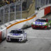 WINSTON SALEM, NORTH CAROLINA - FEBRUARY 02: Chase Elliott, driver of the #9 NAPA Auto Parts Chevrolet and Chris Buescher, driver of the #17 Kroger/Tree Top Ford race during the Cook Out Clash at Bowman Gray Stadium on February 02, 2025 in Winston Salem, North Carolina. (Photo by Sean Gardner/Getty Images)