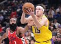 Laker Austin Reaves drives past Clipper James Harden in the second quarter at the Intuit Dome Tuesday.