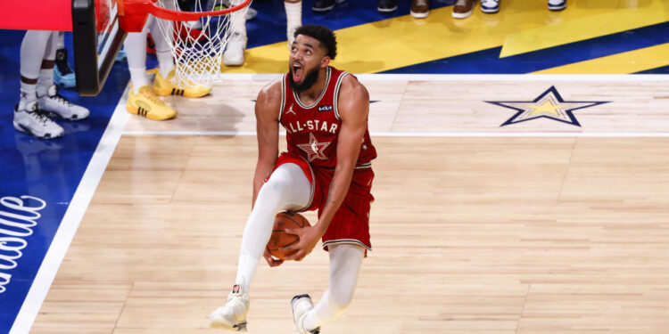 INDIANAPOLIS, INDIANA - FEBRUARY 18: Karl-Anthony Towns #32 of the Minnesota Timberwolves and Western Conference All-Stars drives to the basket against the Eastern Conference All-Stars in the fourth quarter during the 2024 NBA All-Star Game at Gainbridge Fieldhouse on February 18, 2024 in Indianapolis, Indiana. NOTE TO USER: User expressly acknowledges and agrees that, by downloading and or using this photograph, User is consenting to the terms and conditions of the Getty Images License Agreement. (Photo by Justin Casterline/Getty Images)