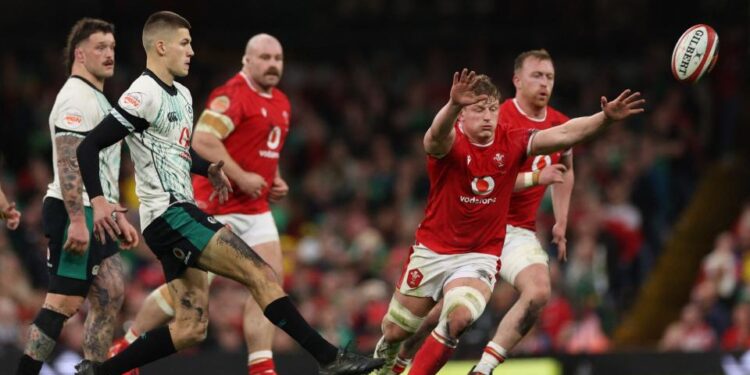 Ireland fly-half Sam Prendergast in action against Wales