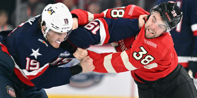 USA and Canada will meet again with higher stakes after a Saturday game produced three fights, including this one between USA's Matthew Tkachuk (No. 19) and Brandon Hagel. (Minas Panagiotakis/Getty Images)