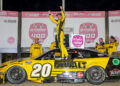 HAMPTON, GEORGIA - FEBRUARY 23: Christopher Bell, driver of the #20 DEWALT Toyota, celebrates in victory lane after winning the NASCAR Cup Series Ambetter Health 400 at Atlanta Motor Speedway on February 23, 2025 in Hampton, Georgia. (Photo by Jonathan Bachman/Getty Images)