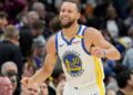 Steph Curry celebrates against the Sacramento Kings