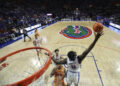 GAINESVILLE, FLORIDA - JANUARY 07: Rueben Chinyelu #9 of the Florida Gators blocks a shot during the second half of a game against the Tennessee Volunteers at Stephen C. O'Connell Center on January 07, 2025 in Gainesville, Florida. The Florida Gators won 73-43. (Photo by James Gilbert/Getty Images)