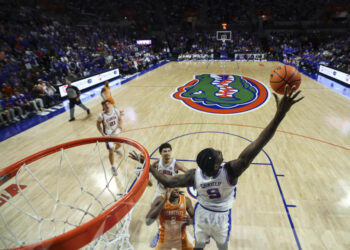 GAINESVILLE, FLORIDA - JANUARY 07: Rueben Chinyelu #9 of the Florida Gators blocks a shot during the second half of a game against the Tennessee Volunteers at Stephen C. O'Connell Center on January 07, 2025 in Gainesville, Florida. The Florida Gators won 73-43. (Photo by James Gilbert/Getty Images)