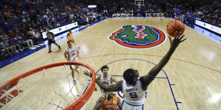 GAINESVILLE, FLORIDA - JANUARY 07: Rueben Chinyelu #9 of the Florida Gators blocks a shot during the second half of a game against the Tennessee Volunteers at Stephen C. O'Connell Center on January 07, 2025 in Gainesville, Florida. The Florida Gators won 73-43. (Photo by James Gilbert/Getty Images)