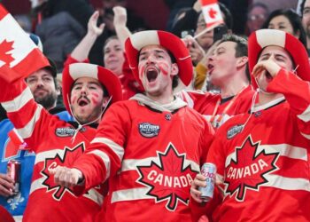 <span>Canada fans cheer their team as they take to the ice ahead of their 4 Nations Face-Off hockey game against the United States in Montreal on Saturday night.</span><span>Photograph: Graham Hughes/AP</span>