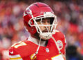 KANSAS CITY, MISSOURI - JANUARY 26: Travis Kelce #87 of the Kansas City Chiefs warms up prior to the AFC Championship NFL football game against the Buffalo Bills at GEHA Field at Arrowhead Stadium on January 26, 2025 in Kansas City, Missouri. (Photo by Perry Knotts/Getty Images)