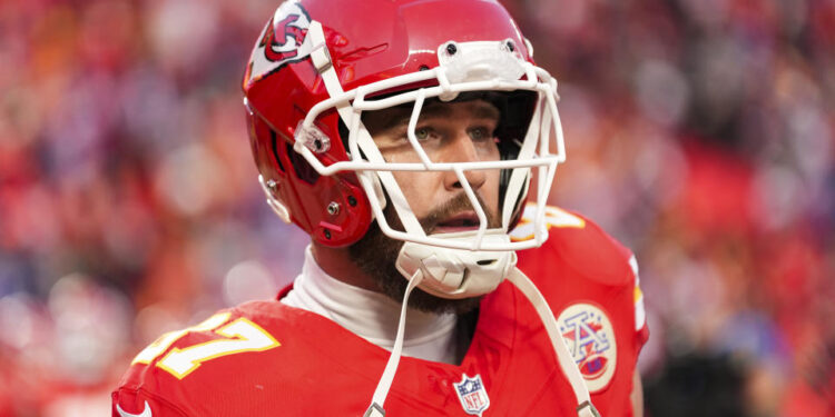 KANSAS CITY, MISSOURI - JANUARY 26: Travis Kelce #87 of the Kansas City Chiefs warms up prior to the AFC Championship NFL football game against the Buffalo Bills at GEHA Field at Arrowhead Stadium on January 26, 2025 in Kansas City, Missouri. (Photo by Perry Knotts/Getty Images)