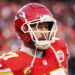 KANSAS CITY, MISSOURI - JANUARY 26: Travis Kelce #87 of the Kansas City Chiefs warms up prior to the AFC Championship NFL football game against the Buffalo Bills at GEHA Field at Arrowhead Stadium on January 26, 2025 in Kansas City, Missouri. (Photo by Perry Knotts/Getty Images)