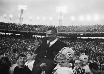 Packers players carry Vince Lombardi off the field after winning Super Bowl II in 1968. (Bettmann Archives/Getty Images)