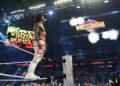 Jey Uso points to the WrestleMania 41 sign.