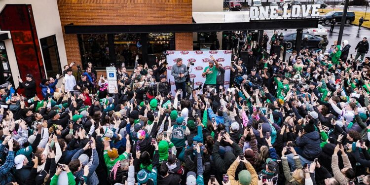 Aerial view of Eagles fans and Saquon Barkley