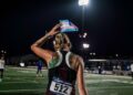 Sadie Schreiner with a trans flag