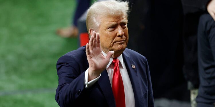 Trump waves