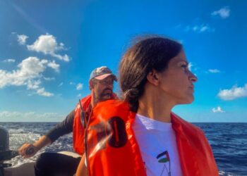 Woman and man on dinghy