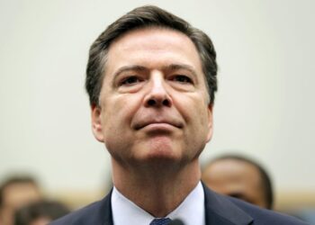 FBI Director James Comey arrives for a House Judiciary hearing on "The Encryption Tightrope: Balancing Americans' Security...