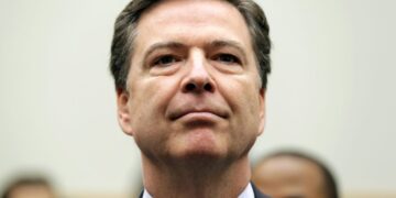 FBI Director James Comey arrives for a House Judiciary hearing on "The Encryption Tightrope: Balancing Americans' Security...