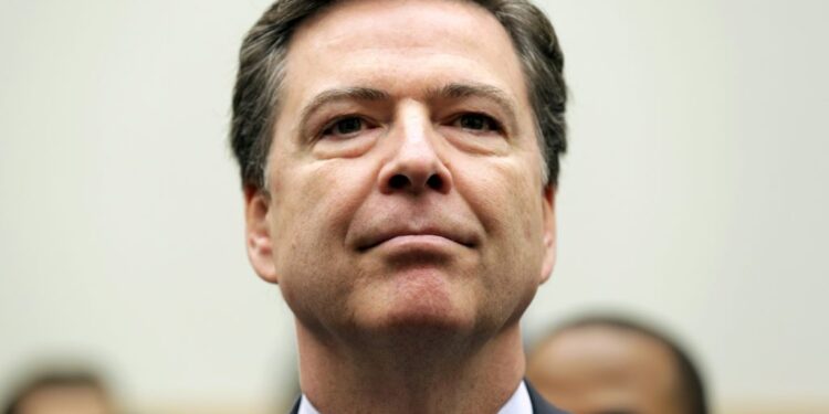 FBI Director James Comey arrives for a House Judiciary hearing on "The Encryption Tightrope: Balancing Americans' Security...