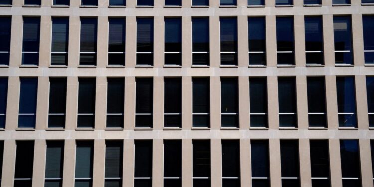 FILE PHOTO: Demonstrators rally in support of U.S.Department of Education outside its building in Washington