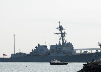 U.S. Navy guided missile cruiser docks at a naval base near the entrance to the Panama Canal