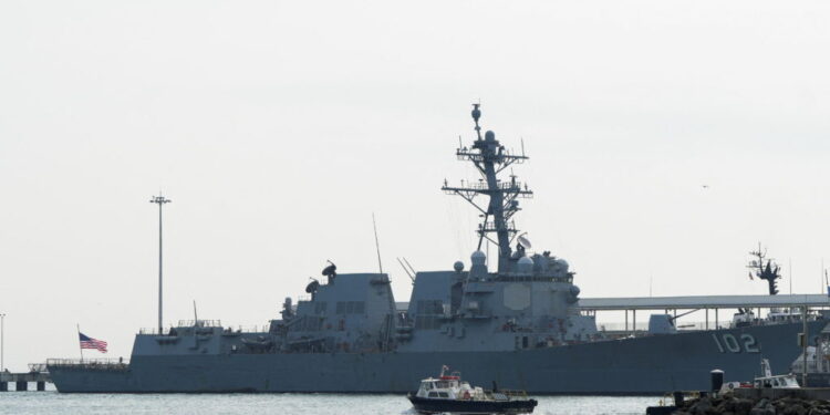 U.S. Navy guided missile cruiser docks at a naval base near the entrance to the Panama Canal