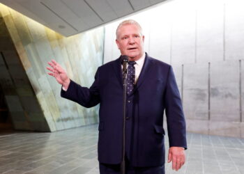 Ontario Premier Doug Ford speaks to journalists before a meeting with federal, provincial and territorial leaders at the C...