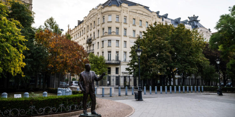 Statue of former U.S. President Bush stands in front of the Embassy of the United States of America in Budapest