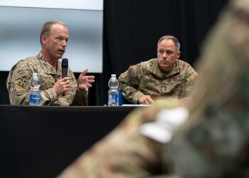 U.S. Army Lt. Gen. John Kolasheski and U.S. Army Maj. Gen. Christopher LaNeve speak with reporters in Poland near the Ukra...