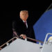 U.S. President Donald Trump boards Air Force One as he departs for Asia, at Joint Base Andrews